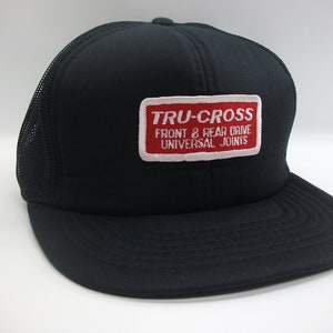 May include: Black trucker hat with a red and white patch that says "TRU-CROSS FRONT & REAR DRIVE UNIVERSAL JOINTS"