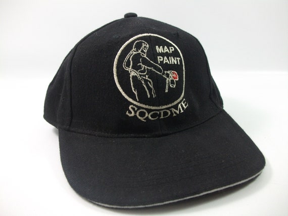 black strapback baseball cap
