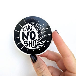 太陽と月が描かれた、Take No Sh*t Do No Harm（何も気にしない、害を与えない）ビニールステッカー