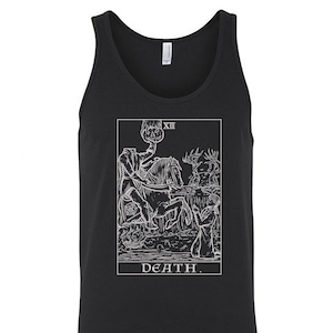 May include: Black tank top featuring a white graphic of the Death tarot card. The card depicts a skeletal figure riding a horse, carrying a scythe and an hourglass. The card number, XIII, is in the top right corner. The text "DEATH." is at the bottom of the card.