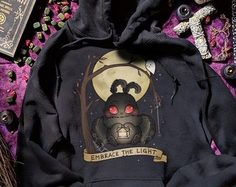 Embrace The Light Baby Mothman Hoodie Spooky Cute Hoodies Cryptid Merch Goth Clothing Gothic Sweatshirt Halloween Sweater Adorable Horror