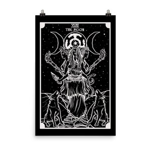 May include: Black and white illustration of the Moon tarot card. The card depicts a three-headed goddess standing between two howling wolves. The goddess is surrounded by a crescent moon and stars.