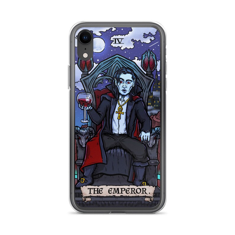 May include: A phone case featuring a tarot card illustration of The Emperor. The Emperor is depicted as a vampire, sitting on a throne, holding a glass of wine. The card is set against a dark, starry night sky.