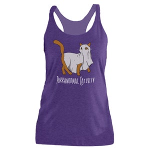 May include: Purple tank top with a graphic of a cat wearing a ghost costume. The text "Purranormal Cativity" is printed below the cat.