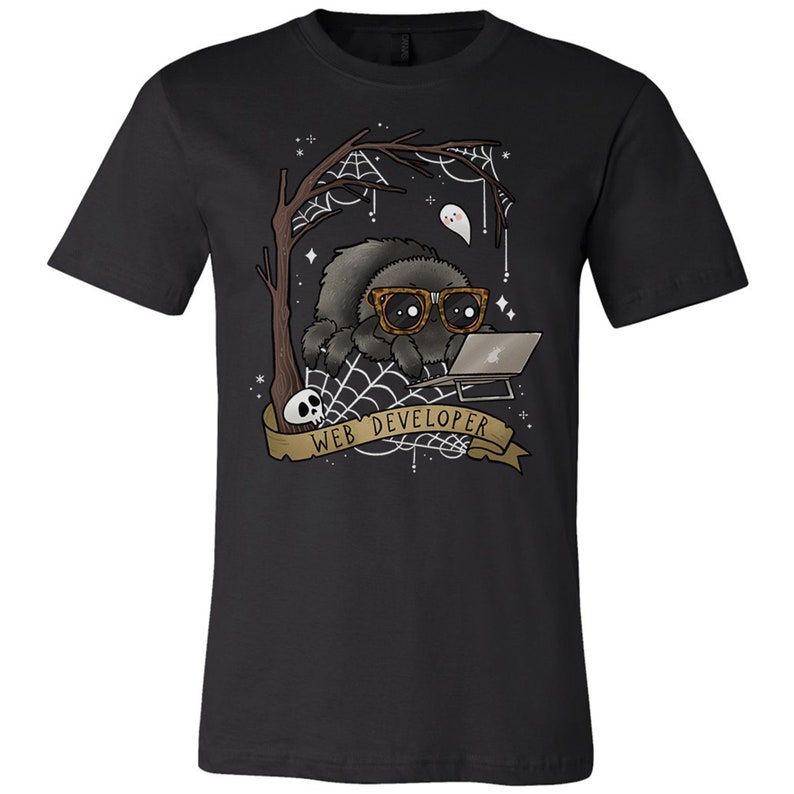 May include: Black t-shirt featuring a cartoon spider wearing glasses and working on a laptop. The design includes a tree, spiderwebs, a ghost, and a banner that reads "WEB DEVELOPER". A skull is also present in the design.