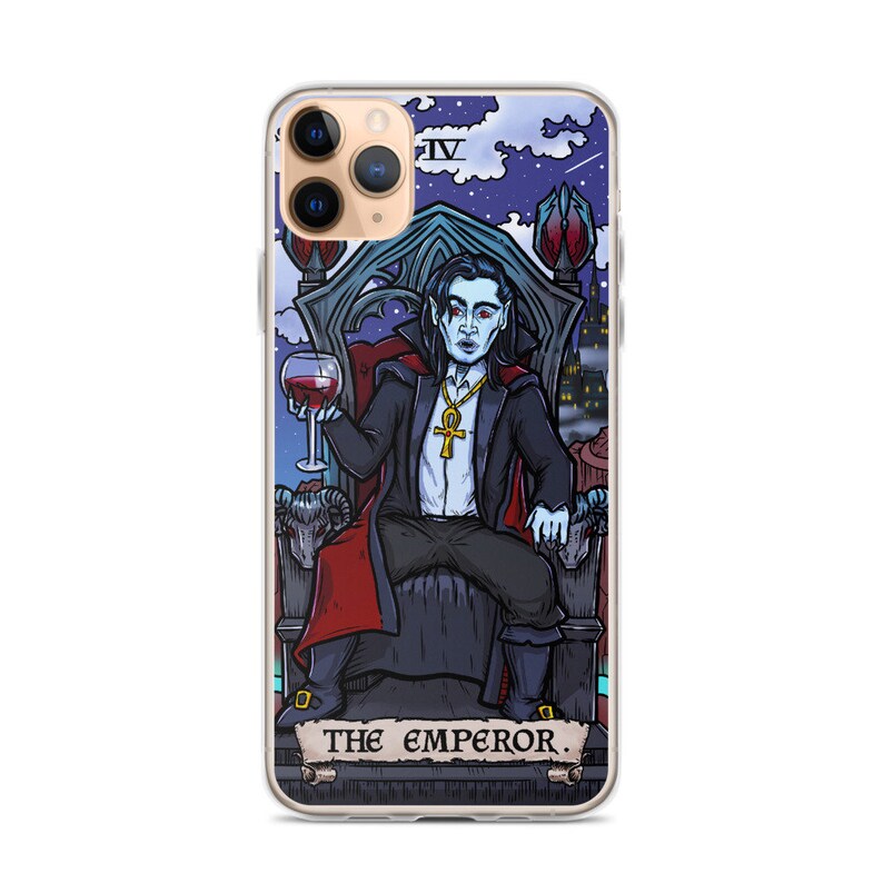 May include: A phone case with a clear background and a colourful illustration of a vampire sitting on a throne. The illustration is in the style of a tarot card and includes the text "THE EMPEROR."