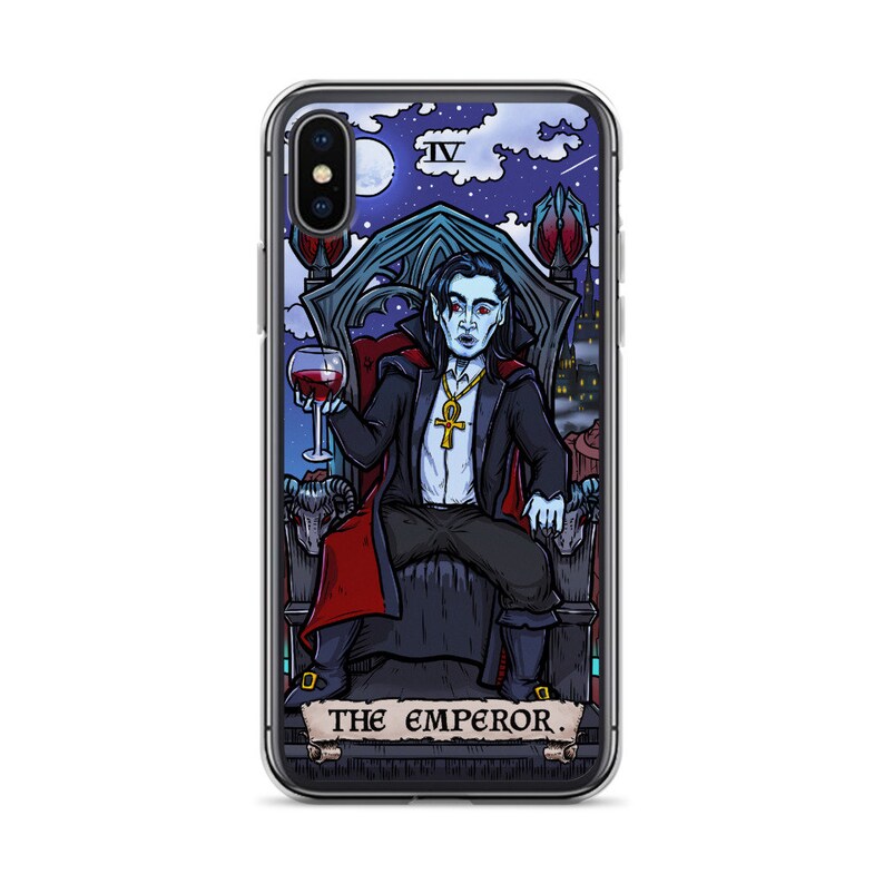 May include: A clear phone case featuring a colourful illustration of a vampire seated on a throne, holding a glass of wine. The illustration is in the style of a tarot card, with the text "THE EMPEROR." at the bottom.