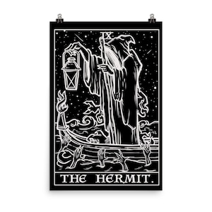 May include: Black and white illustration of The Hermit tarot card. The card depicts a robed figure holding a lantern and walking on a boat. The figure is surrounded by stars and waves. The text "THE HERMIT" is at the bottom of the card.