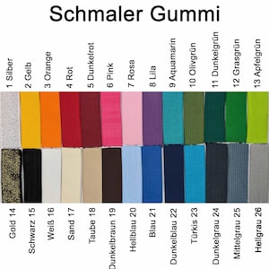 May include: A chart displaying 26 different colours of narrow elastic bands. The colours are labelled with numbers 1 through 26 and the corresponding colour names in German.