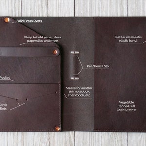 May include: A brown leather notebook cover with multiple pockets and slots. It features a strap to hold pens, rulers, and paper clips. The cover is made of vegetable tanned full grain leather and has solid brass rivets. The text "Solid Brass Rivets" is printed on the cover.