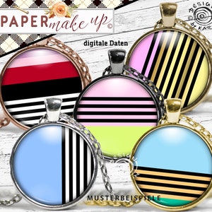 May include: Four round glass pendants with different geometric patterns. The pendants are black and white stripes, black and gold stripes, pink and black stripes, and blue and black stripes. The pendants are on chains and are ready to be made into necklaces.