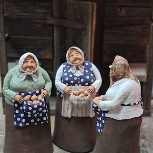 Une femme de la campagne vend des œufs