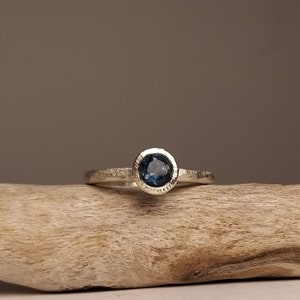 Silver engagement ring with dark blue topaz image 6