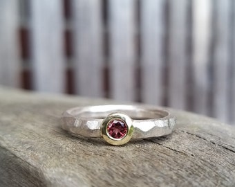 Silver ring with red spinel set in 750 yellow gold - also an engagement ring