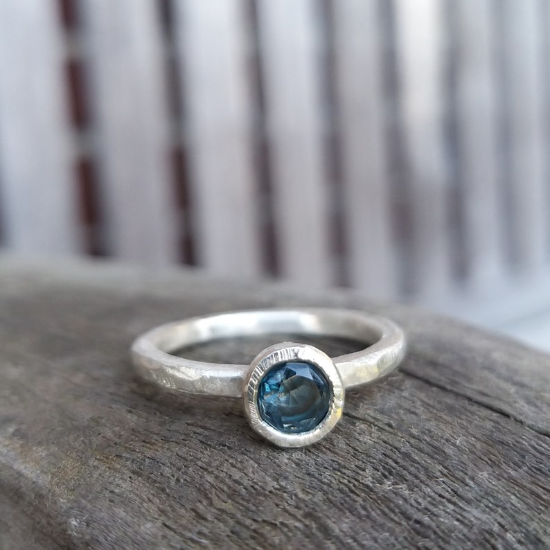 Silver engagement ring with dark blue topaz image 10