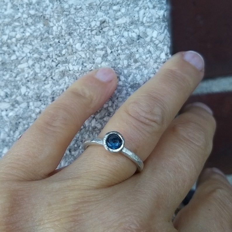 Silver engagement ring with dark blue topaz image 4