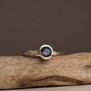 Silver engagement ring with dark blue topaz image 5