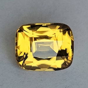 Natural Zircon, Vivid yellow color. 3.29ct, no treatment, Cushion cut. CD1529