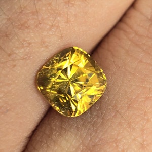 Natural Zircon, Vivid yellow color. 4.85ct, no treatment, Cushion cut. CD1853
