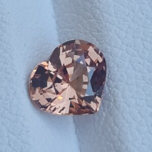 Natural Malaya Garnet, Golden heart, 1.19ct. Heart shape gem. Rare color. Cd1239