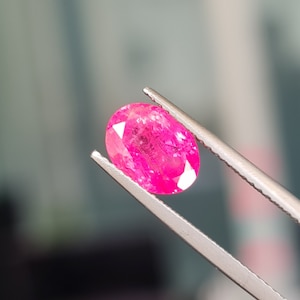 Natural Vivid Pink Spinel, 1.99ct. No treatment. Glowy, Oval shape. Mahenge Spinel, heavy inclusions. cd826