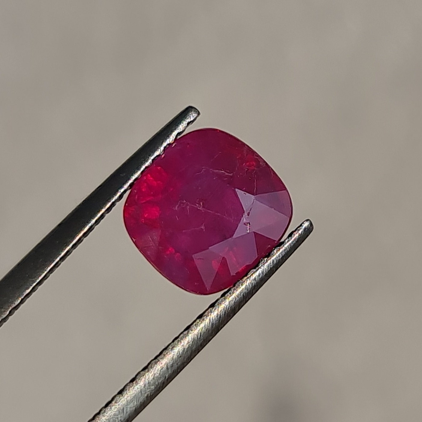 Natural Ruby, 3.00ct, Milky Fluorescent Pinkish Red. Cushion Shape