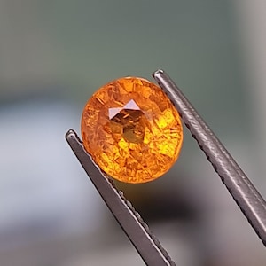Spessartite Garnet, Fanta orange, 1.41ct. Vivid orange, very bright gemstone. CD865