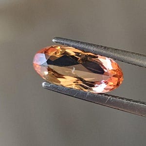 Natural Imperial Topaz, 1.58ct. Oval cut Topaz. Natural no treatment. CD1946