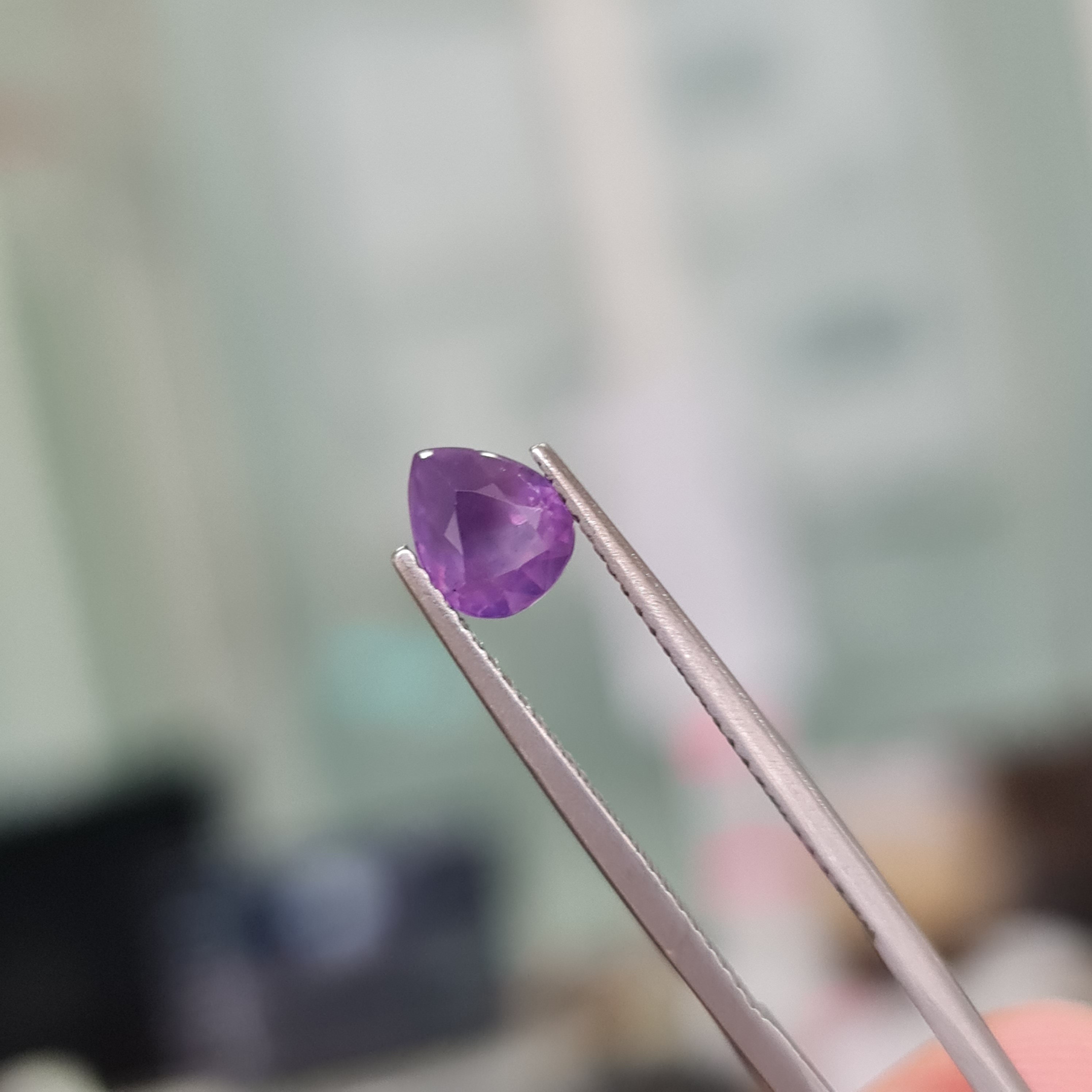 Hazzy Silky Dark purple Sapphire. 1.26ct, Pear shape. Silky deep purple color, no heat no treatment. fluorescent in UV light. CD389