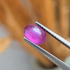 Pink Purple Sapphire. 1.31ct, oval cut. Faceted and Cabochon. Pink color. No heat/ no treatment. SAP
