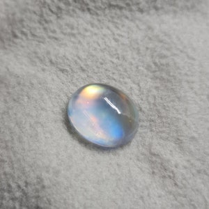 reserved. Rainbow Moonstone, rare 11.43ct natural moonstone (1 pc). Super reflective rainbow hue. Cabochon. Certificate available. CD657