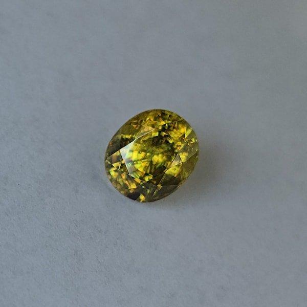 Natural Sphene, 2.08ct greenish yellow. Very bright! Rare collectors gemstone. Cd813