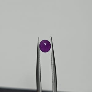 Hackmanite Gemstone, 0.68ct Oval Cabochon, Intense Color Change