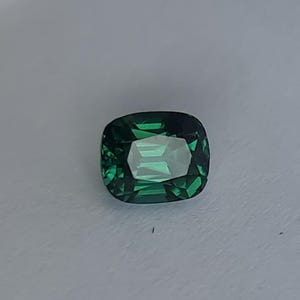 Dark Green Tourmaline, 1.63ct. Perfect cushion cut, slight deep blue Green. Natural no treatment. CD1207