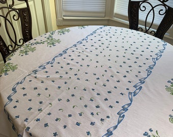 Blue and white printed tablecloth Oval sweet details of serged scalloped borders with blue thread embroidery