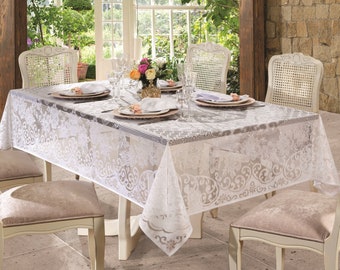Nappe rectangulaire en dentelle blanche à motif floral victorien.