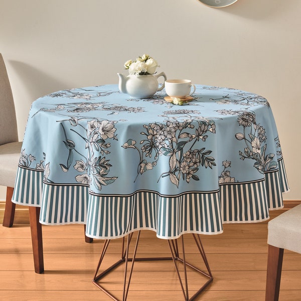 Round Blue Printed tablecloth- 62" printed with flowers and solid striped border