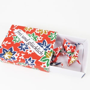 Small box with crane(s), origami as an original souvenir, mini gift