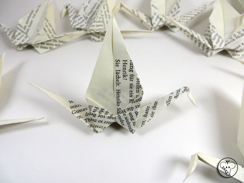 10 Origami Kraniche Aus Buchpapier Als Tischdeko Für Literaturliebhaber Und Bücherfreunde