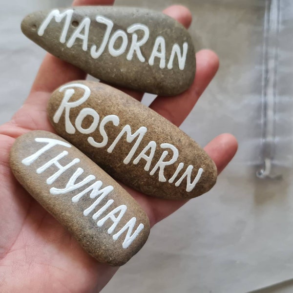 A handful of herbs, stones, hand-inscribed.
