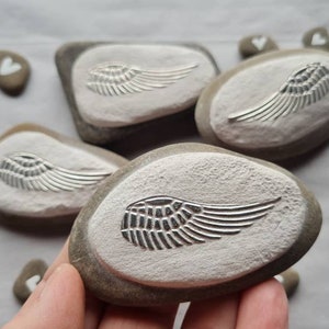 Wing stone, grave decoration