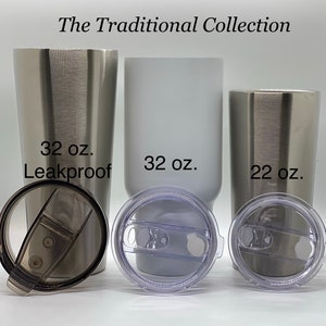 May include: Three stainless steel tumblers with lids. The tumblers are 32 oz, 32 oz, and 22 oz. The 32 oz tumblers are silver and white. The 22 oz tumbler is silver. The text "The Traditional Collection" is at the top of the image. The 32 oz silver tumbler has the text "32 oz. Leakproof".