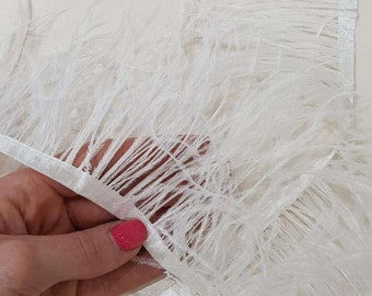 Light ivory natural ostrich feathers on a ribbon, MC003