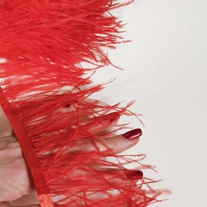 Red natural ostrich feathers on a ribbon, MC036