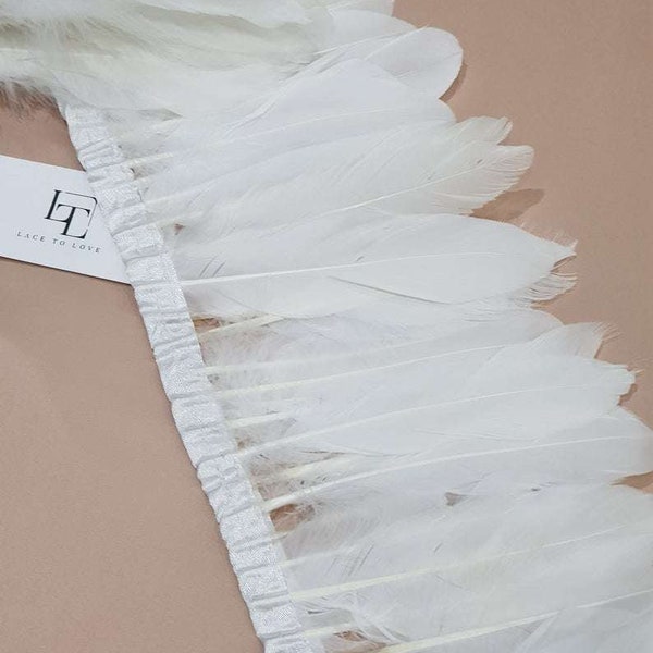 White natural goose feathers on a ribbon, sold by the meter, MC025