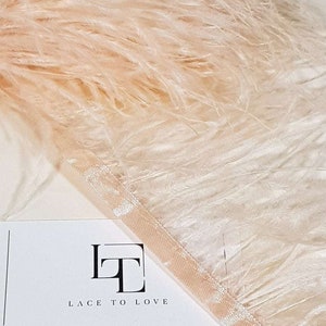 Salmon pink natural ostrich feathers on a ribbon, MC043