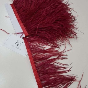 Burgundy natural ostrich feathers on a ribbon, MC008