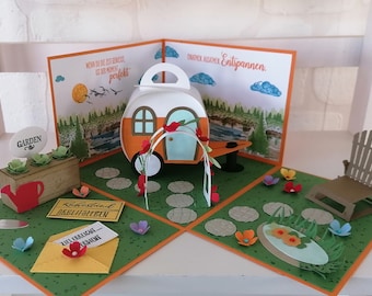 Explosionsbox mit Wohnwagen und Garten zum Ruhestand