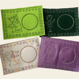 May include: Four felt placemats with a star border and a circle in the center. Each placemat features a different color and a simple embroidered design of a person.