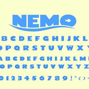 May include: Blue alphabet font with a fish icon and the word "NEMO" in a stylized font. The font includes uppercase letters, numbers, and punctuation marks.